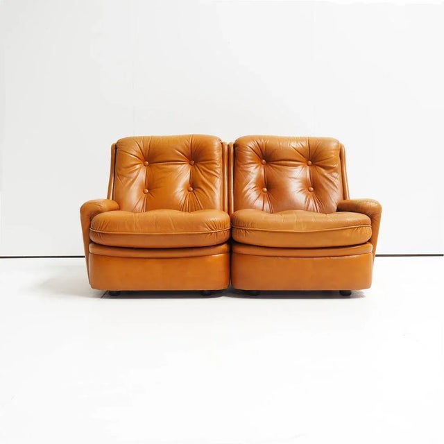 1970s leather two-seater from the ‘Orchidée’ series designed by Michel Cadestin for Airborne. Like all Airborne furniture...