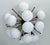 Italian sputnik flush mount with glossy white pebble shaped Murano glass shades mounted on solid brass frame in bronze...