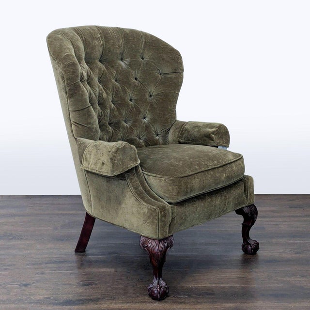This Thomasville lounge chair features a classic tufted backrest and plush olive green upholstery for superior comfort....