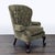 This Thomasville lounge chair features a classic tufted backrest and plush olive green upholstery for superior comfort....
