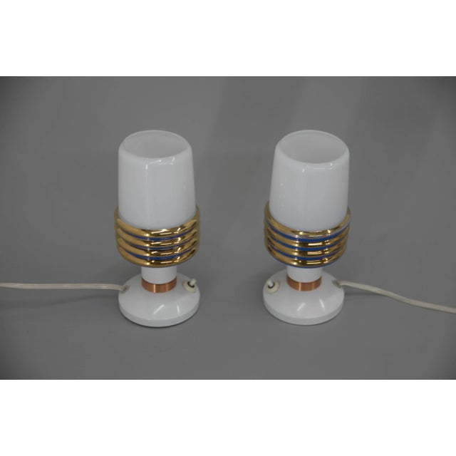 Set of two table lamps made of glass and metal. Very good original condition 1x40W, E25-E27 bulb US plug adapter included....