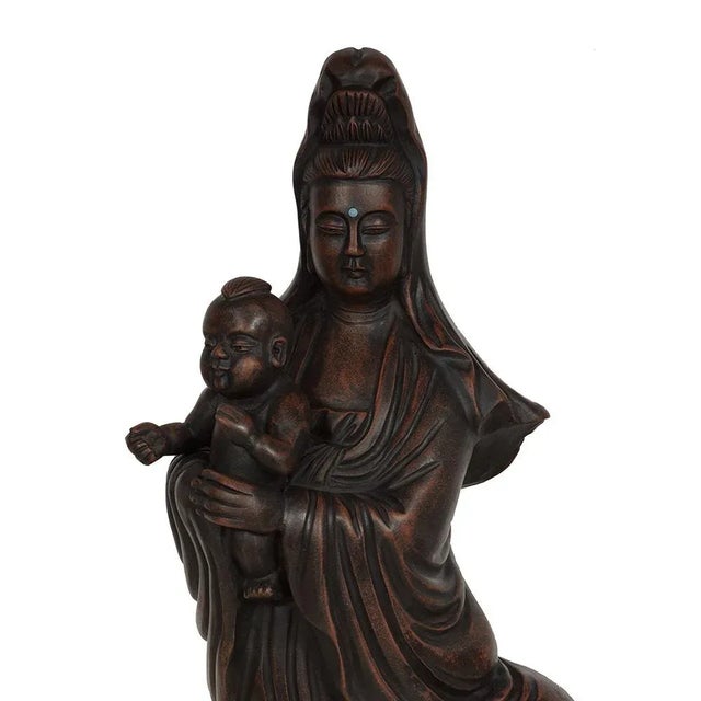 Look at this magnificent Vintage Chinese Carved Kwan Yin Statuary. It shows very detailed hand carving works and wonderful...