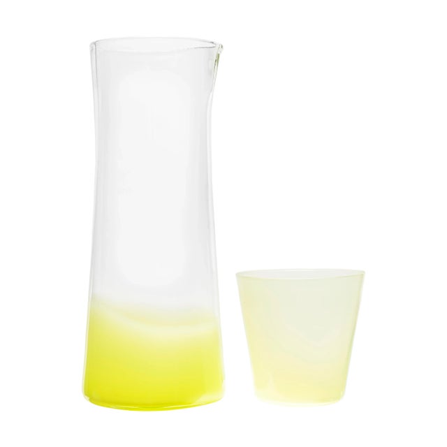 Add a thoughtful flair of fancy to your table with Celerie Kemble's glassware in whimsical color combinations and modern...