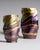Two fine-porcelain vases combining the folded, softly undulating forms of dutch ceramicist johan van loon with helmut...