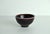 Bowl made of stoneware in the 1960s with oxblood glaze. Designed by Gerd Bøgelund (1923-1987) for Royal Copenhagen,...
