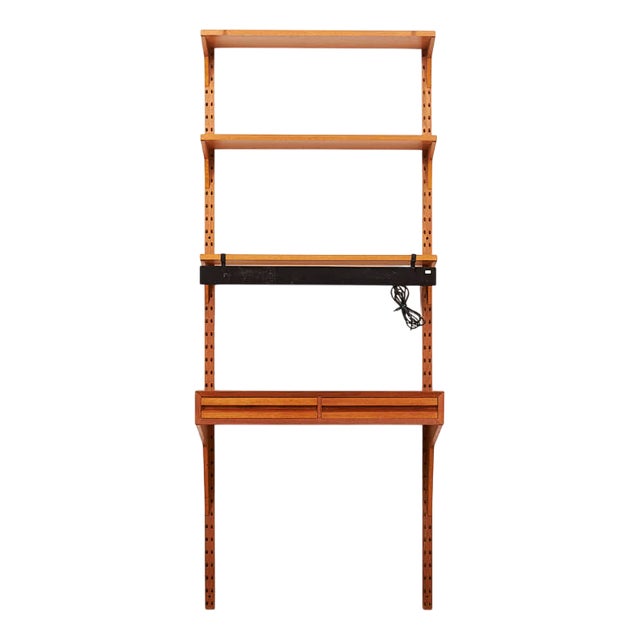 Wall Shelf Royal System 1 in Teak Wood with Writing Shelf & Black Metal Clip-on Lamp by Poul Cadovius for Cado, 1948 For Sale