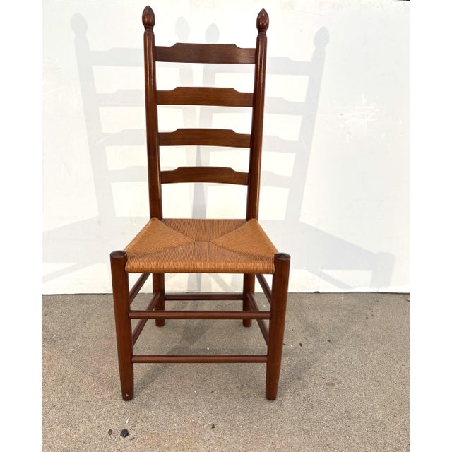A set of six - Ladder Back dining chairs made with wide, inviting horizontal rungs that offer superb back support. A...