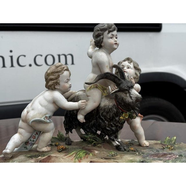 Porcelain Group of Nude Putti & the Goat Amalthea on Wooden Display Stand For Sale - Image 5 of 16