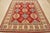 A tribal Caucasian Kazak rug hand-knotted with an all-wool pile on a cotton foundation. This oriental rug features rows of...