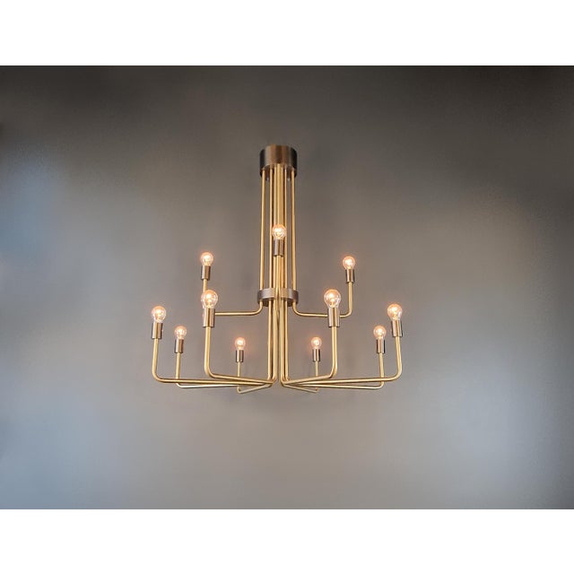 This impressive chandelier is a new, in-house design, handcrafted in our Berlin workshop. Inspired by the aesthetics of...