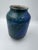 A striking vintage studio pottery vase featuring a beautifully layered glaze in saturated cobalt blue, teal and deep blue-...