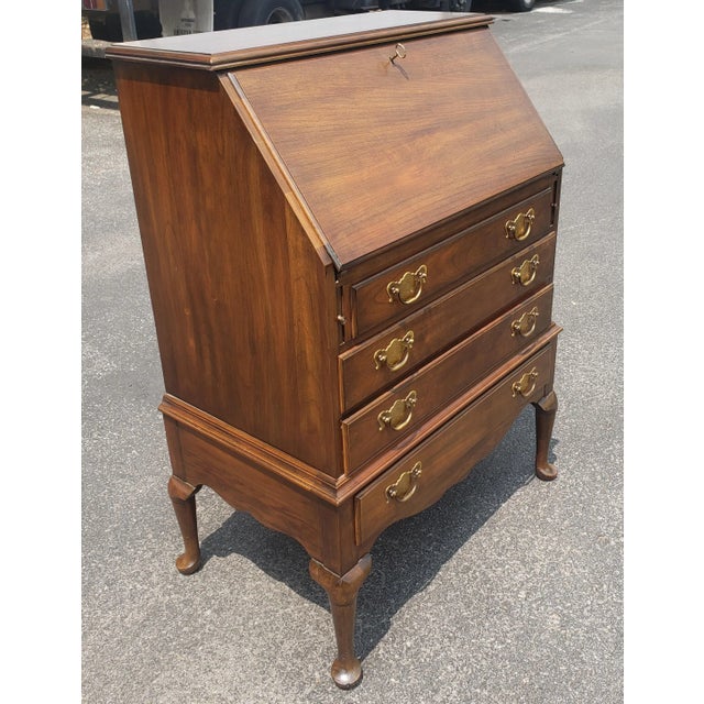 Pennsylvania House Slant Front Cherry Secretary Desk with Lock. Features four fully functional drawers with dovetail...