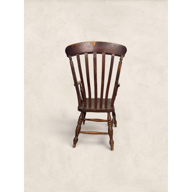 Antique English Elm and Ash Lath-Back Windsor Armchair Solid, well-proportioned, and full of quiet character, this Windsor...