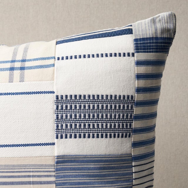 This pillow features Carlisle Patchwork with a knife edge finish. Style meets sustainability in indigo-colored Carlisle...
