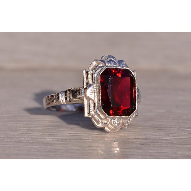 Silver The Trinity River: Antique Art Deco Garnet Ring in White Gold For Sale - Image 8 of 11