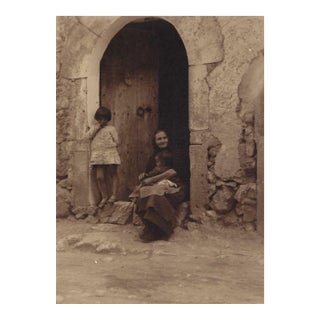 Antique Photograph of a Lady Sitting in a Doorway With Two Children For Sale