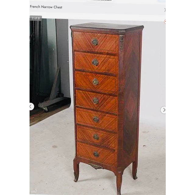 Petite French Louis XVI Parquetry Seven-Drawer Semainier With Marble Top Seven drawers—one for every day of the week. An...