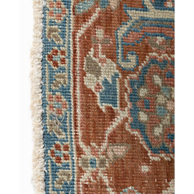 A beautiful hand-knotted rug, traditionally crafted by skilled artisans using fine-quality wool. The hand-knotted...