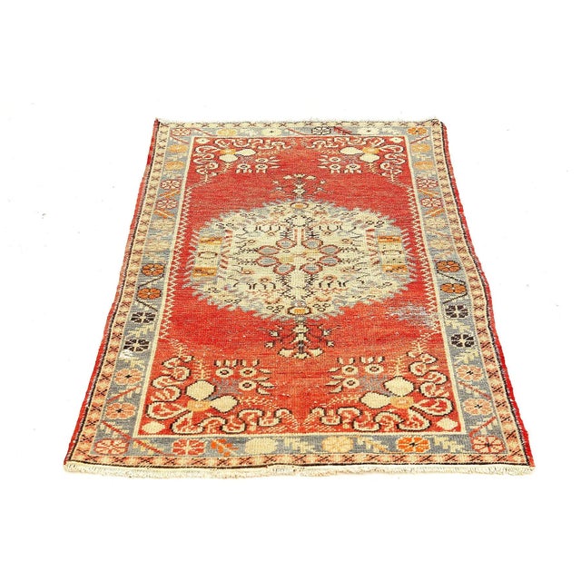 Handknotted vintage wool rug from Oushak region of Turkey. Approximatelly 50-60 years old. In very good condition.