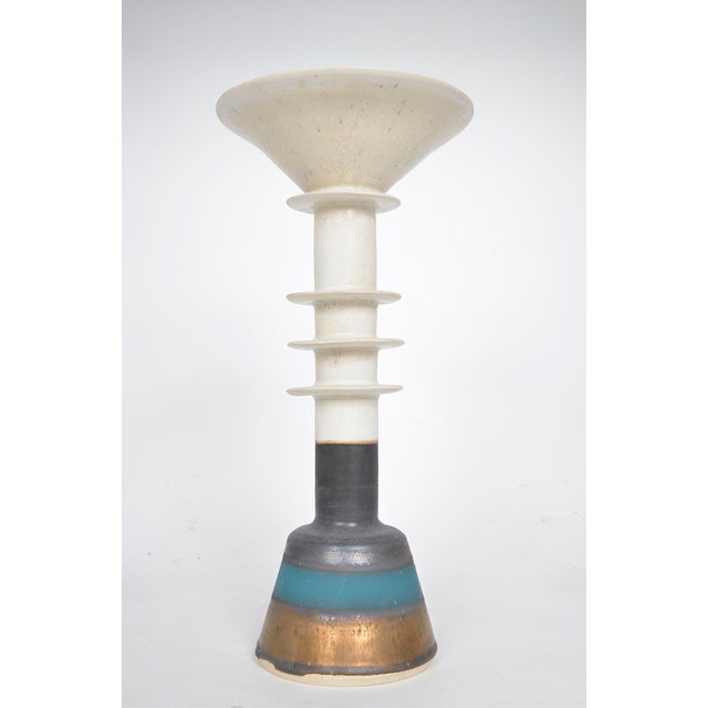 A stunning three hooped ‘pagoda pot’ by dorset potter alan ashpool, with a flared bowl to the top, tiered forms made from...