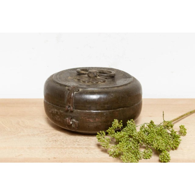 This beautiful, engraved brass box from the deserts of India boasts a rich patina and charming imperfections – a testament...