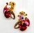 This is part of Chairish’s Costume Jewelry assortment. Aren’t these pretty in pink? Lovely 1940s clip-on earrings signed...
