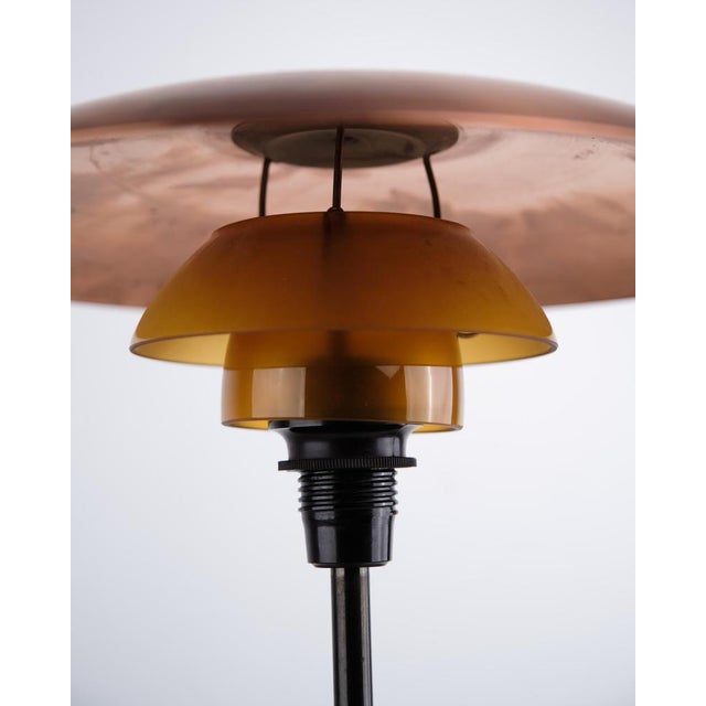 Ph 3.5/2 table lamp designed by poul henningsen and produced by louis poulsen in the 1930s. The lamp is made with a top...