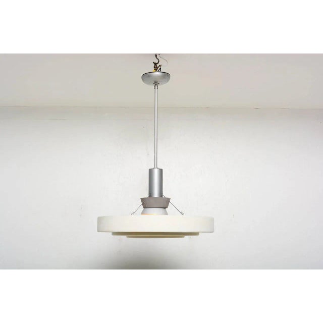 For your consideration hanging lamps with aluminum shades diffusing the light. Original vintage condition. There are six...