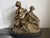 A beautifully detailed late-19th-century French gilt-bronze figural group attributed to Adrien Étienne Gaudez (French,...