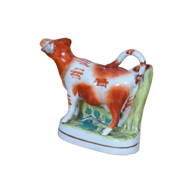 Antique 19th century Staffordshire porcelain flatback figural cream pitcher / bud vase in the shape of a red and white cow...