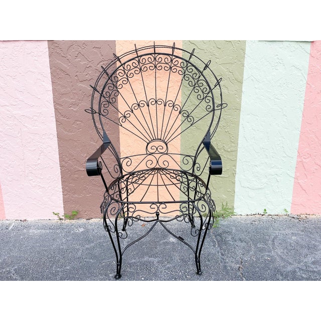 Wrought iron peacock chair sales