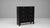 This 20th Century French black patinated wooden chest of drawers blends utilitarian charm with a striking, timeworn...