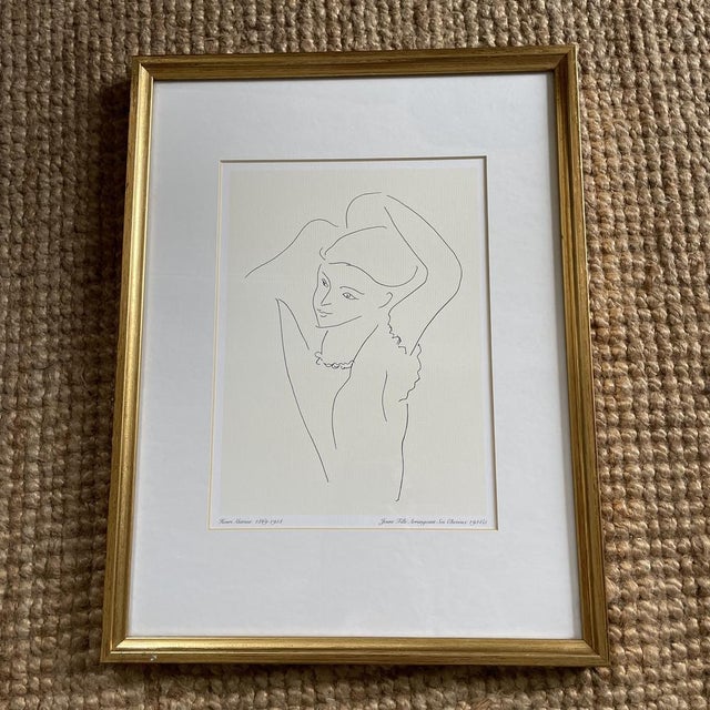 Lithograph by Henri Matisse "young girl arranging her hair" 1934. Presented in a pretty gilded wooden frame.