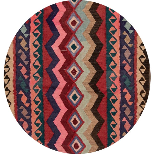 Vintage hand-woven Persian Kilim with a geometric motif. This piece has great detailing and beautiful colors, it would be...