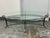 Design Plus Gallery presents a Vintage French Art Deco Style Wrought Iron Oval Glass Coffee Table. This distinctive table...