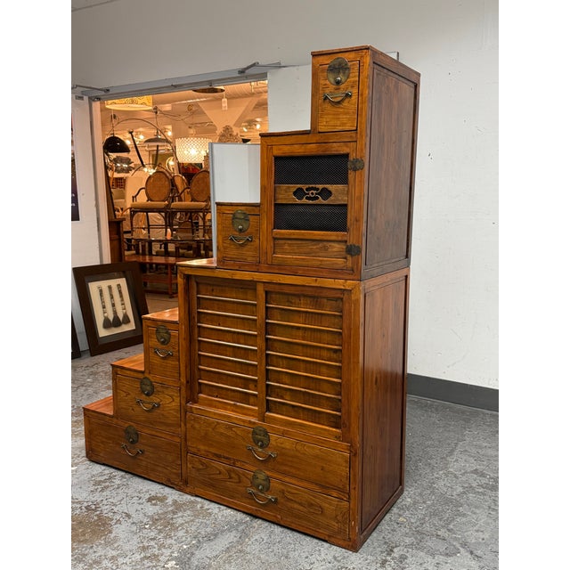 Design Plus Gallery presents a Vintage Japanese Kaidan-Dansu Step Chest. This two-piece step chest is made from solid...
