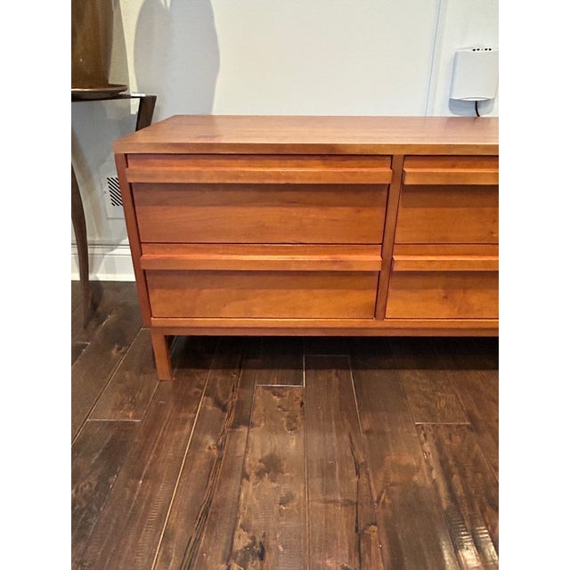 Gorgeous custom made low slung sophisticated chest of drawers having beautiful artisan craftsmanship. 6 smoothly operating...