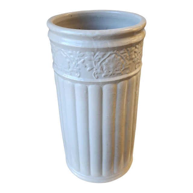 Beautiful white ribbed pottery umbrella/cane stand with a banded vine and leaf pattern at the top, possibly Weller...