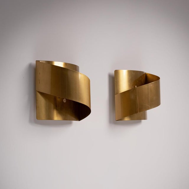 These stunning wall-mounted lamps were crafted by Falkenberg in Sweden and designed by Peter Celsing during the 1960s. The...