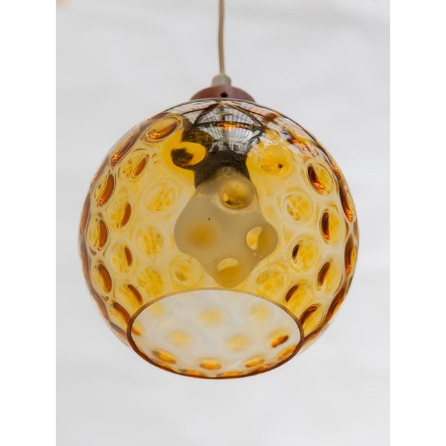 Beautiful teak frame with three Amber glass bowls, Cascade chandelier made in Denmark 1950s. Up to 250V (Europe/UK...