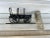 Mid century model of a Western Chuck Wagon with a metal slinky inside. The "Chuck Wagon" desk decoration is a charming and...