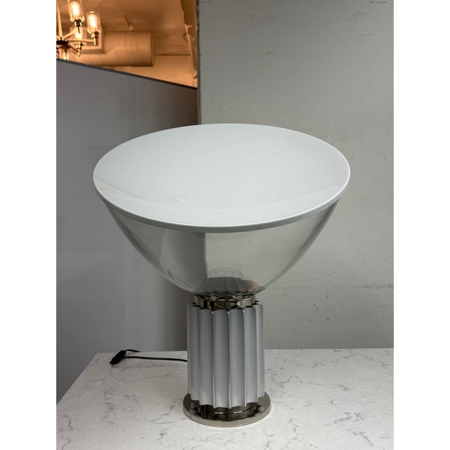 Design Plus Gallery presents the Taccia Table Lamp by Achille & Pier Giacomo Castiglioni for Flos. Originally introduced...