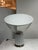Design Plus Gallery presents the Taccia Table Lamp by Achille & Pier Giacomo Castiglioni for Flos. Originally introduced...