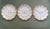 A beautiful trio of milk glass gilt edged serving plates with two divided into sections of three and one with twelve...