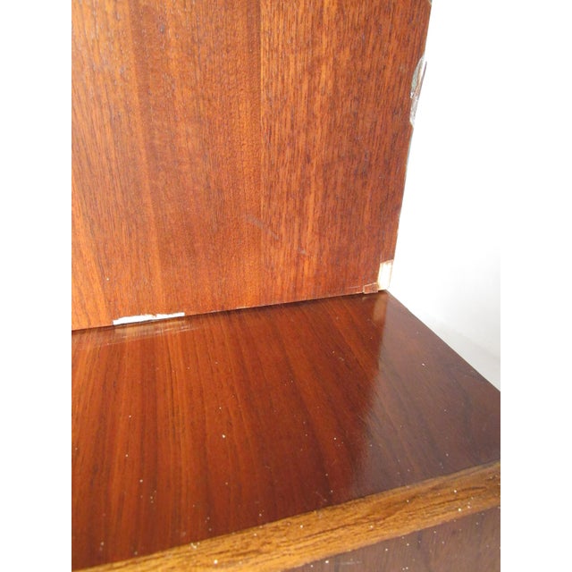 This Mid-Century Modern sideboard features iconic Warren Church design for Lane, including carved wood handles and basket...