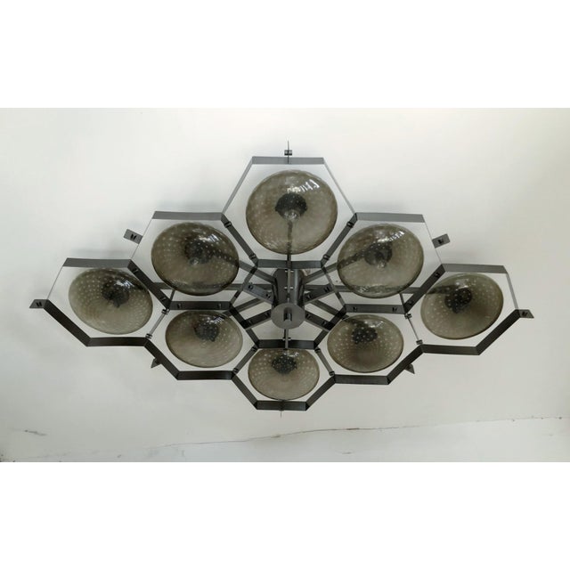 Italian midcentury flush mount with eight smoky Murano glass shades carefully hand blown with bubbles inside the glass...
