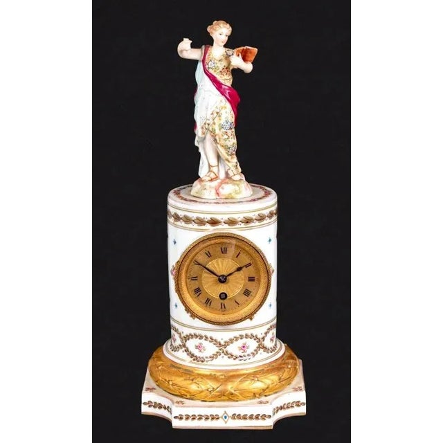 Louis XVI Style Sevres White Ground Figural Pedestal Clock, late 19th century, the brass circular dial, timepiece...