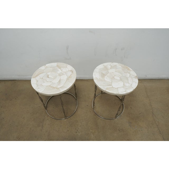 This contemporary Frontgate Sirao Collection side table set showcases a refined balance of organic material and sculptural...