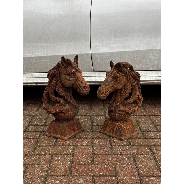 Pair Of Horse Head Statues, Cast Iron, Large In Size. Sizes :- each is 46 cms tall, 33 cms wide Very weathered. Large and...