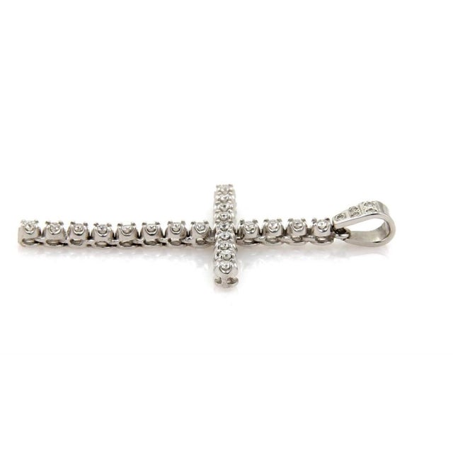 This exquisite Large 14k White Gold Diamond Cross Charm Pendant is a vintage piece of fine jewelry that beautifully...